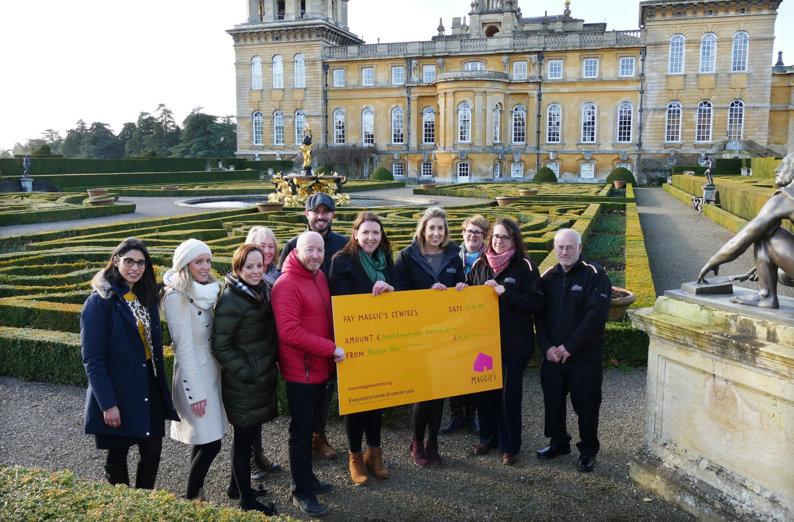 Blenheim Staff Hand Over Giant Cheque to Cancer Charity