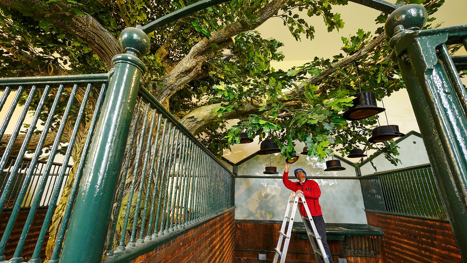 Giant Hat Tree Caps Off New Exhibition in Palace’s Historic Stables
