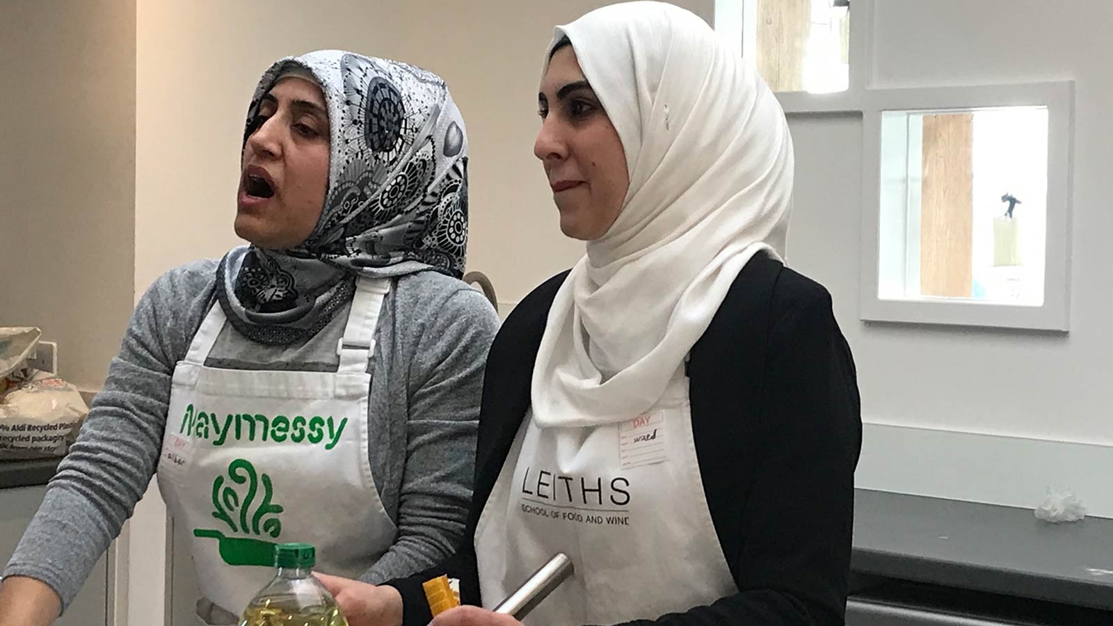 Maymessy mentoring women from Refugee Resource